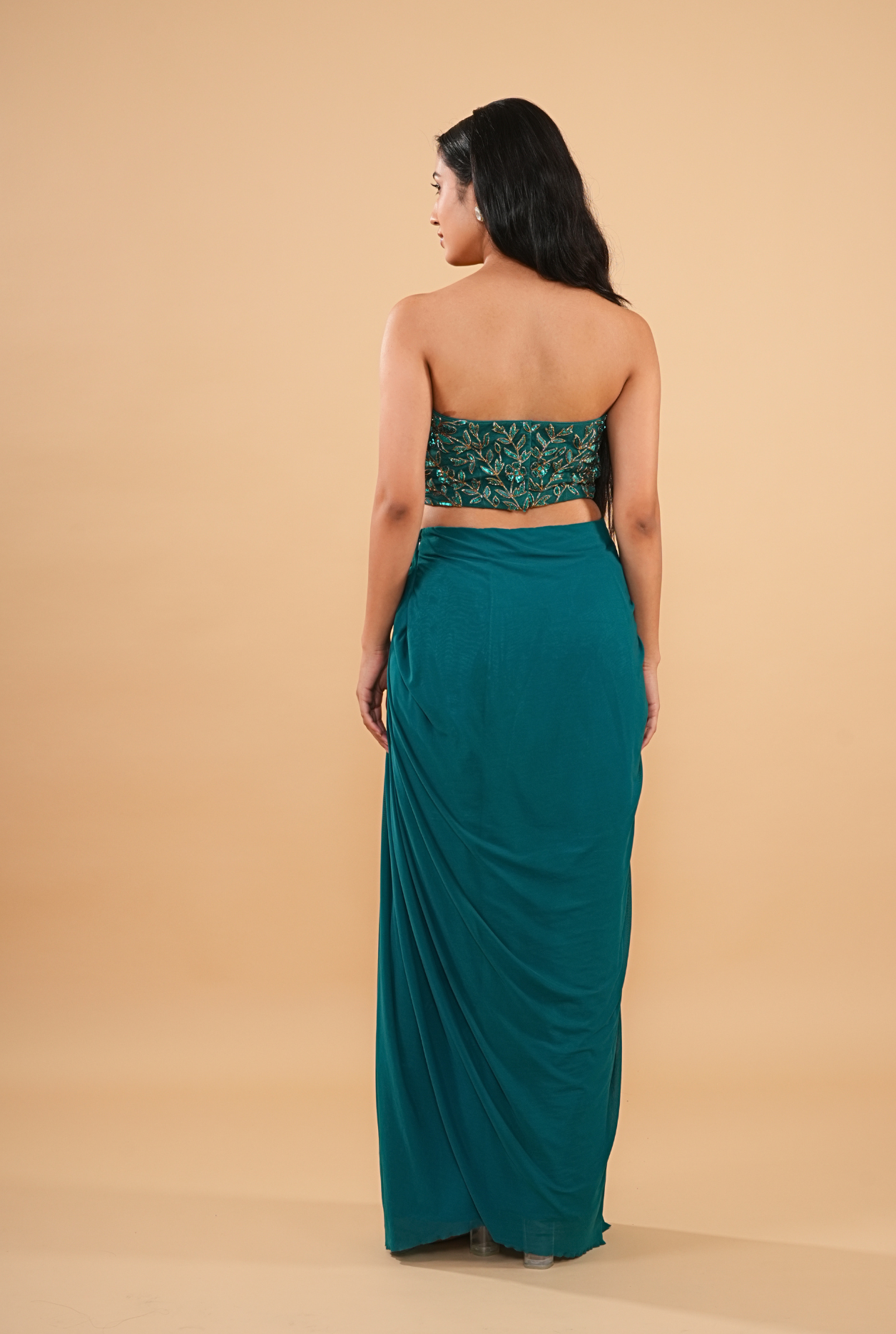THE HAND-BEADED TEAL DRAPED SAREE WITH NET CAPE