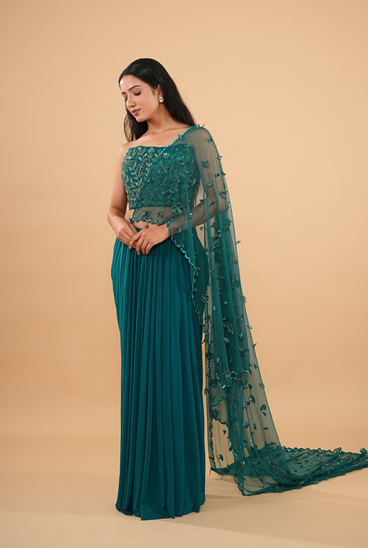 THE HAND-BEADED TEAL DRAPED SAREE WITH NET CAPE