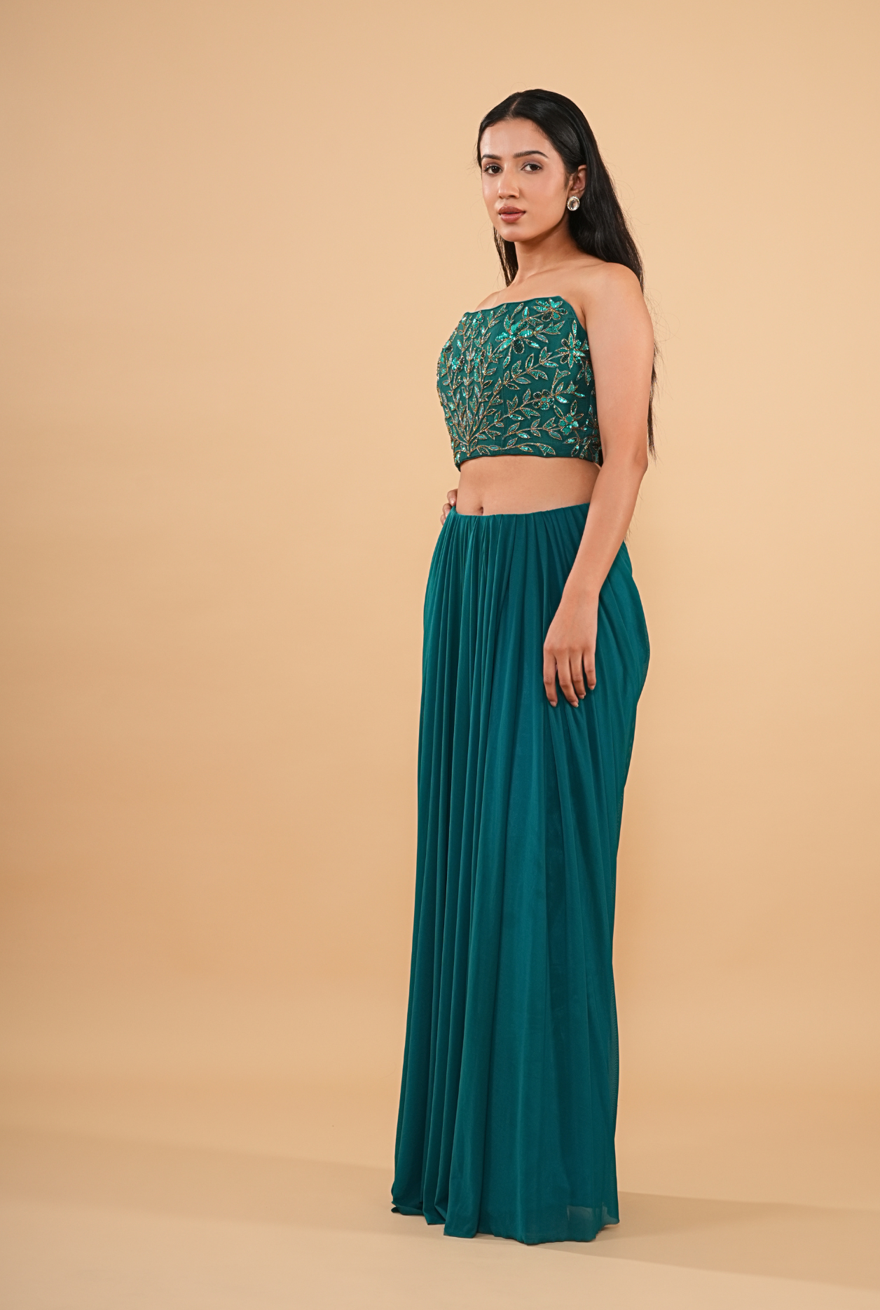 THE HAND-BEADED TEAL DRAPED SAREE WITH NET CAPE