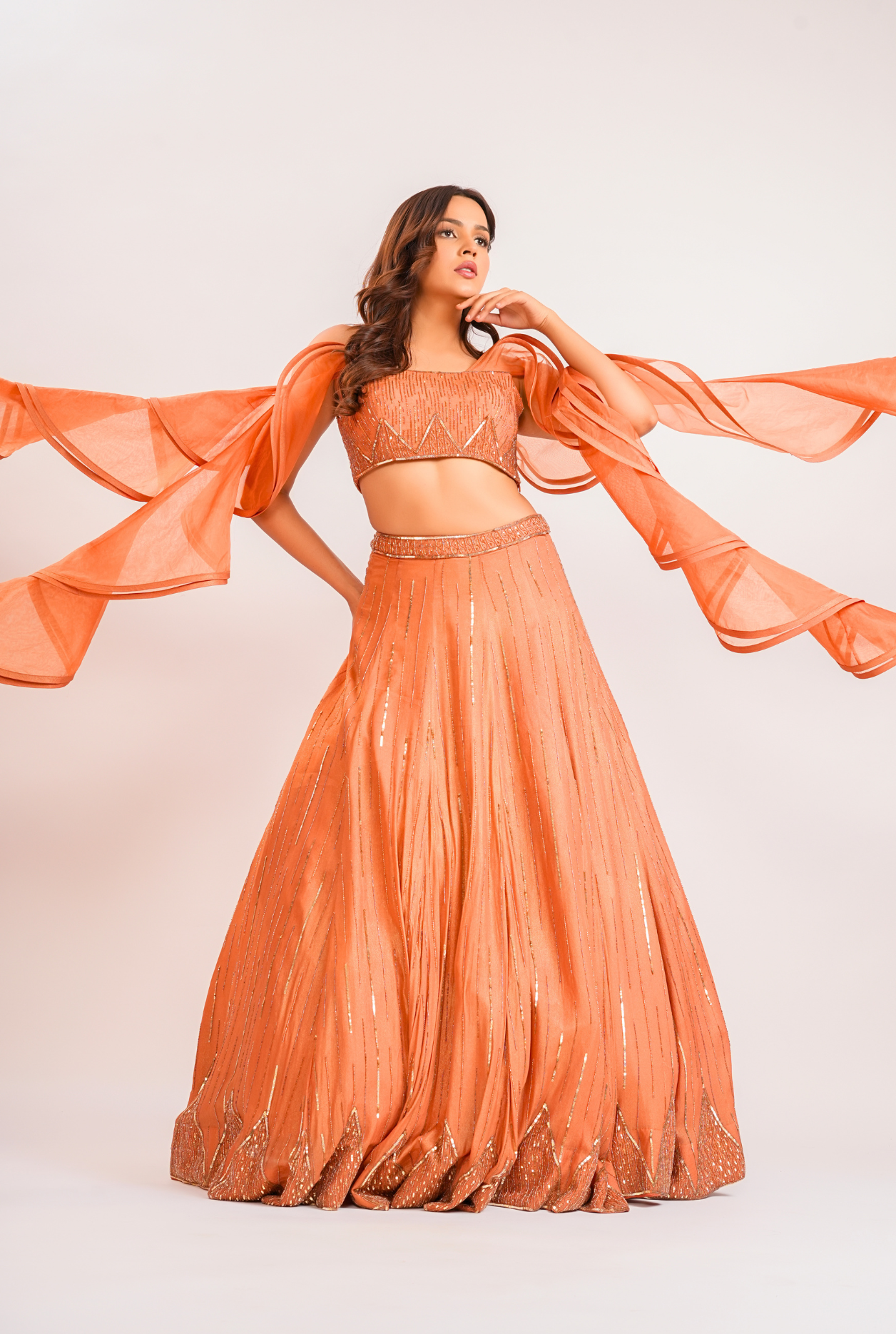 Surkh ruffle lehenga